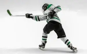 Ice hockey player taking a slap shot