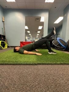 Single leg glute bridges up