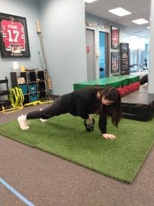 Plank with Kettlebell Pull Through running injury prevention exercise
