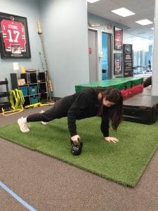 Plank with Kettlebell Pull Through running injury prevention exercise