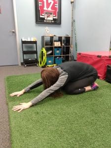 golf player child pose mobility exercise