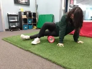 physio patient foam rolling IT band exercise physio patient foam rolling IT band exercise