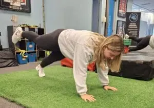 hip abduction banded single leg bridge exercise for cyclists