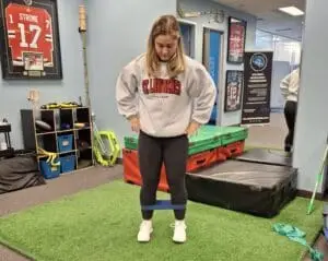 hip abduction banded single leg bridge exercise for cyclists