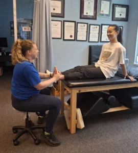 Manual therapy treatment – physiotherapist applying soft tissue techniques for pain relief and recovery Physiotherapy Oakville