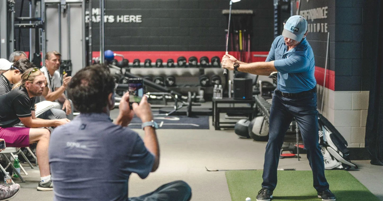 Golf swing during TPI assessment in gym