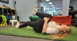 Oakville knee-to-chest stretch — morning low back pain relief