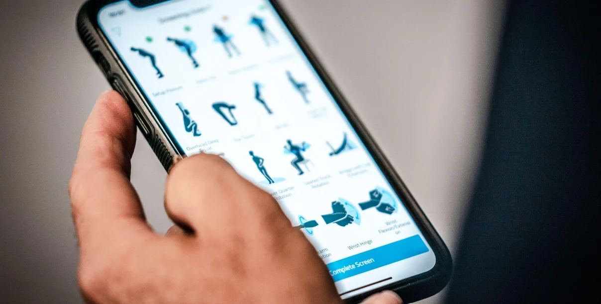 Smartphone displaying golf exercises for TPI assessment
