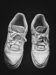 Proper footwear for young athletes — well-fitted running shoes to prevent sprains and sports injuries